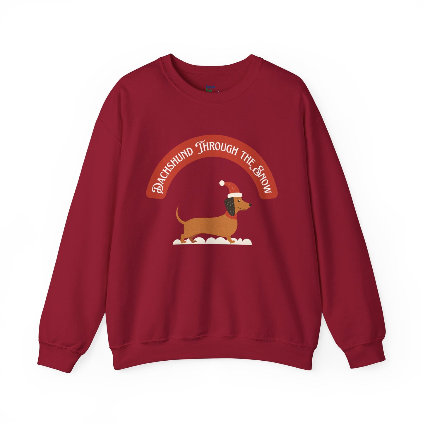 Dachshund Through the Snow | Unisex Heavy Blend™ Crewneck Sweatshirt - Sweatshirt | A quirky, joy-filled design from Have Fun Spread Joy.