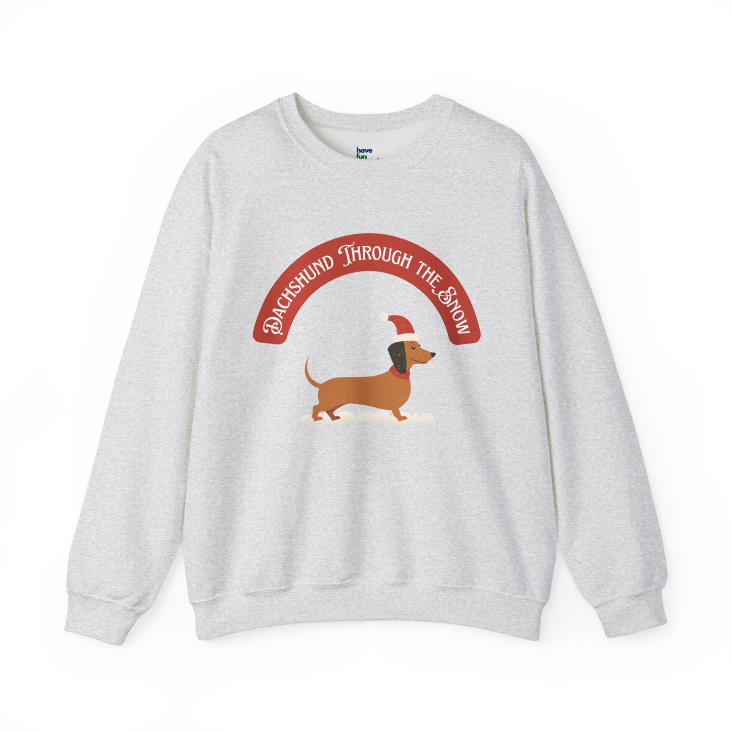 Dachshund Through the Snow | Unisex Heavy Blend™ Crewneck Sweatshirt - Sweatshirt | A quirky, joy-filled design from Have Fun Spread Joy.